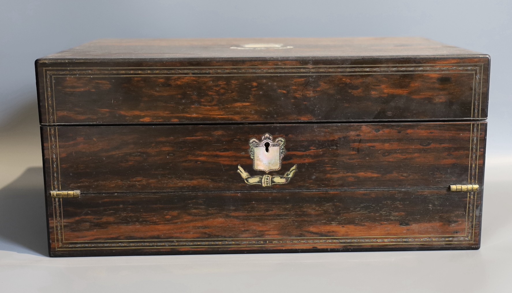 A Victorian mother of pearl inlaid coromandel writing slope